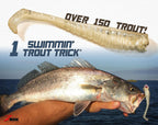 Translucent speckled tan swimbait lure shown with a caught fish