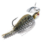 Dark-speckled silver chatterbait lure with red eye and metal-flecked skirt