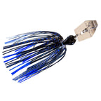 Chatterbait lure with blue black skirt and dark head, tan metal blade