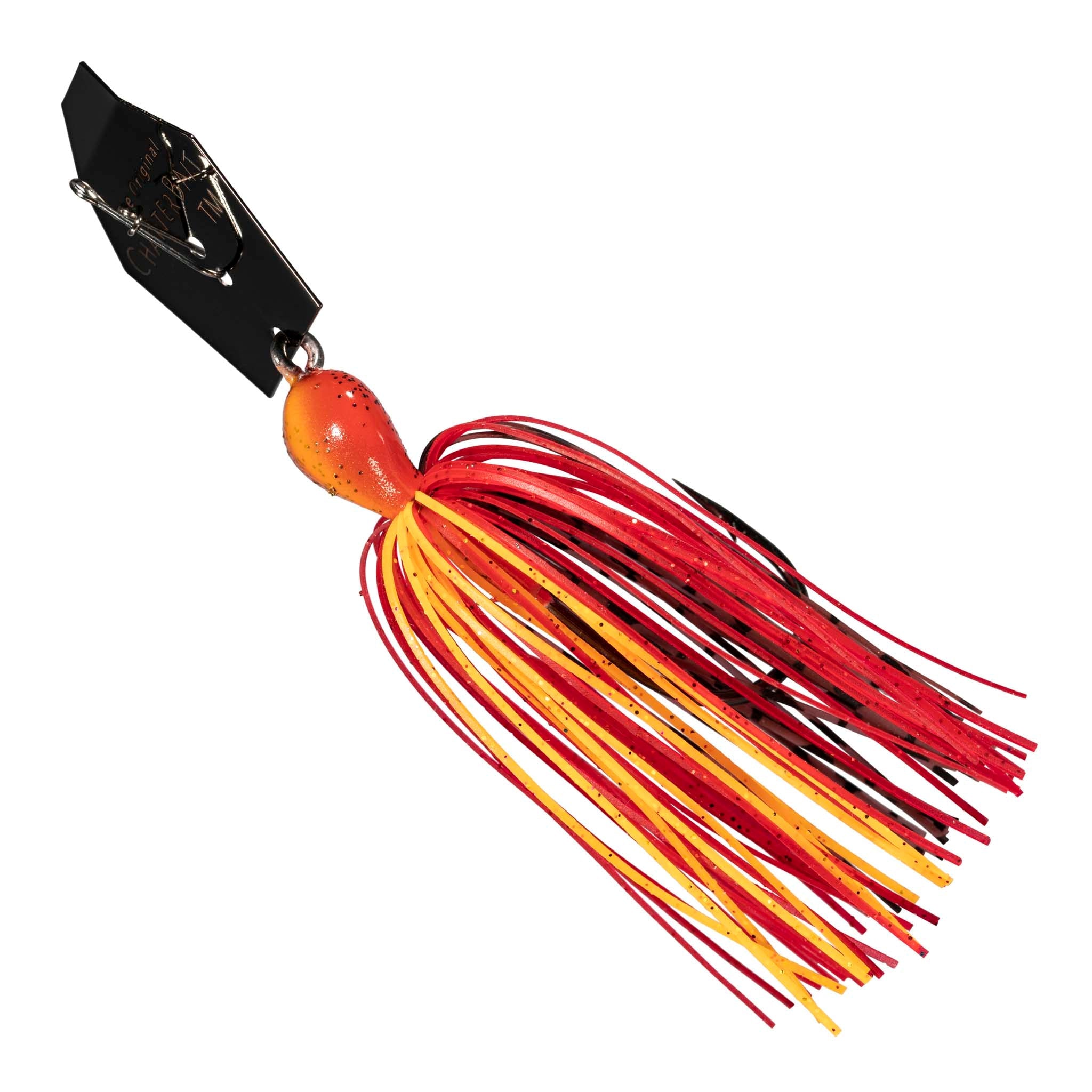 Chatterbait fishing lure with black blade, orange-red head, and red skirt with yellow strands