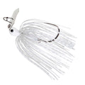 White chatterbait fishing lure with silvery skirt, bucktail strands, and silver metal blade
