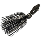 Fishing lure with black skirt, silver-black head, and dark metal blade with hook