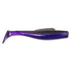 Soft plastic fishing lure, purple-blue glitter back with dark speckles and translucent tail