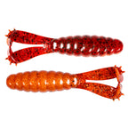 Two red glitter segmented swimbait fishing lures with treble hooks