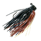 Fishing jig with black and copper marabou skirt strands and round eye hook