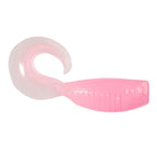 Pink translucent soft plastic fishing lure with curled tail and ribbed body.