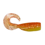 Orange soft plastic fishing lure with translucent body, gold speckles, curled tail.