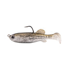 Fishing lure with light gray speckled body and pale cream tail, weed guard hook