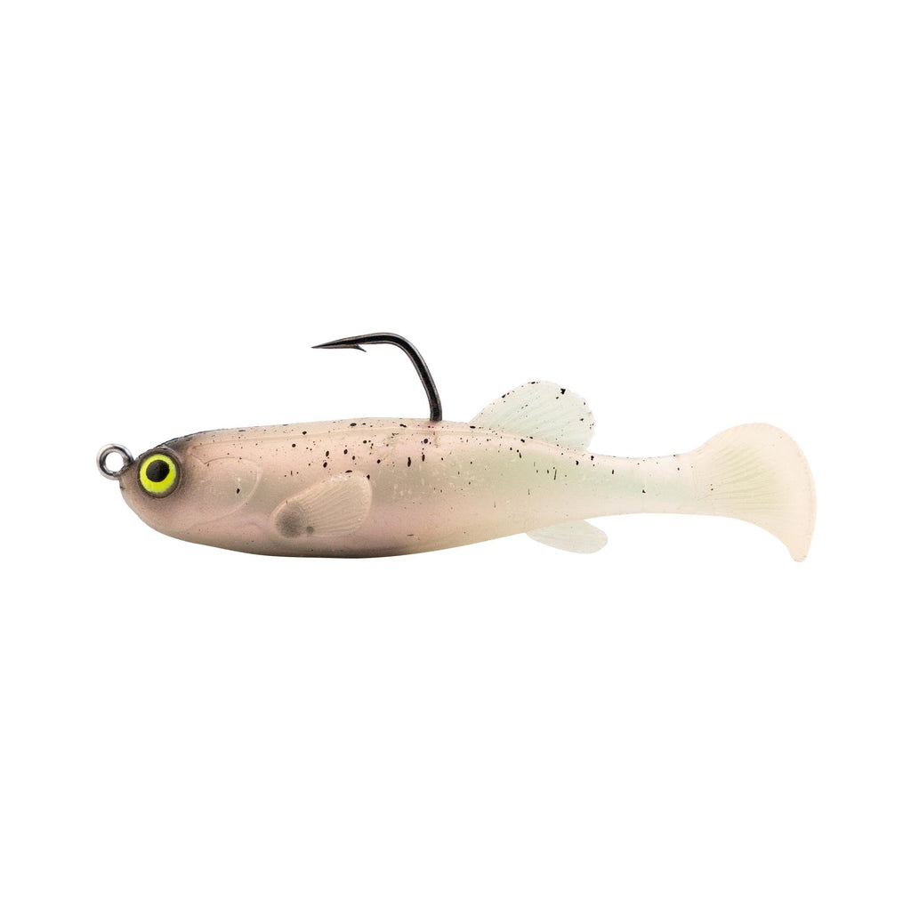 Fishing lure with white body and green eye, pale cream tail, weed guard hook