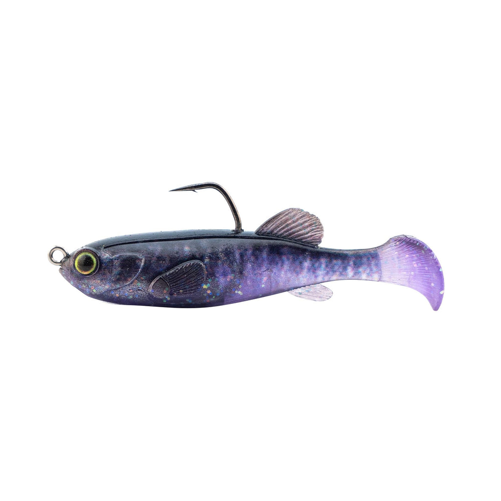 Fishing lure with purple-blue body and pale purple tail, weed guard hook
