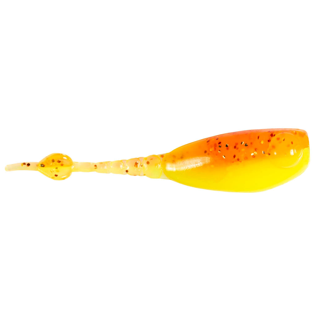 Fishing lure in yellow with orange glow and small black specks, paddle tail