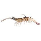 Tan shrimp-style fishing lure with blue eye detail, black hook, translucent striped legs