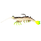 Cream shrimp-style fishing lure with neon chartreuse tail fin, black hook, glow-like accents