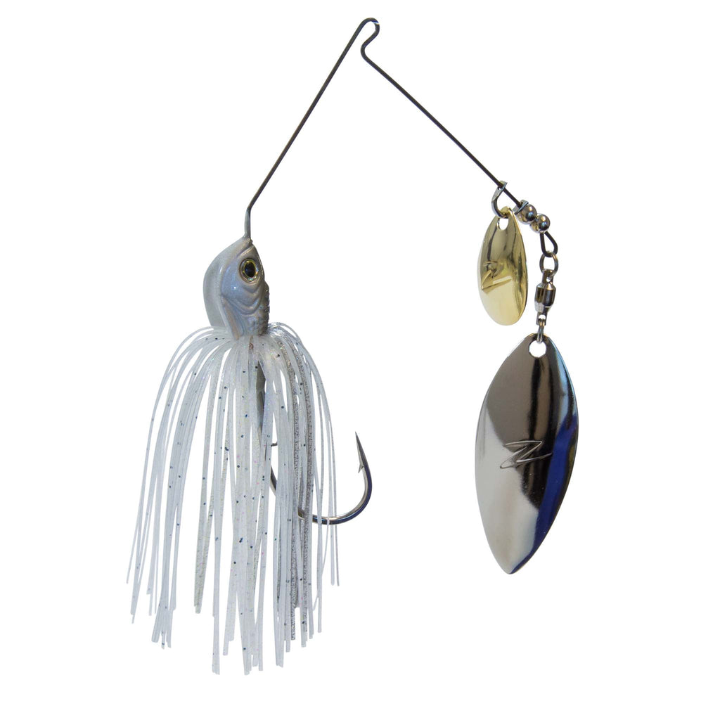 Fishing lure with white skirt, green eye, and dual willow blades in gold and silver.