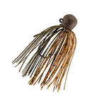 Fishing jig with green-brown skirt strands and speckled round weighted jighead