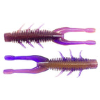 Purple soft plastic craw lure with ribbed body, forked fins, and molded legs