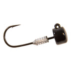 Black jig head lure with bucktail skirt, barbed hook and reflective silver bucktail.